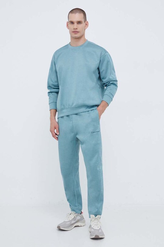 Tréninkové kalhoty Calvin Klein Performance 00GMF3P613 zelená AW23