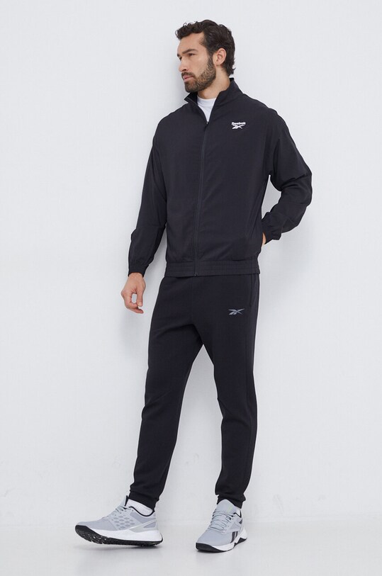 Tepláky Reebok 100049658 černá AW23