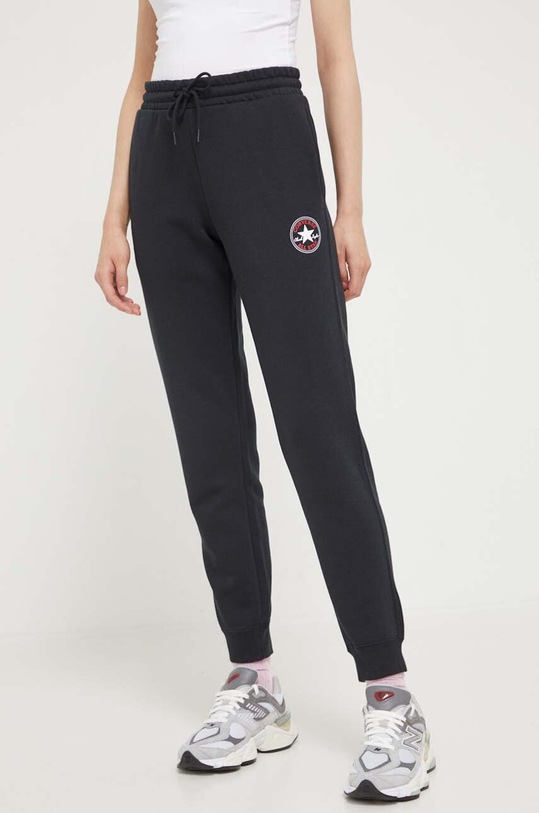 Odzież Converse spodnie dresowe 10025420.A01 czarny