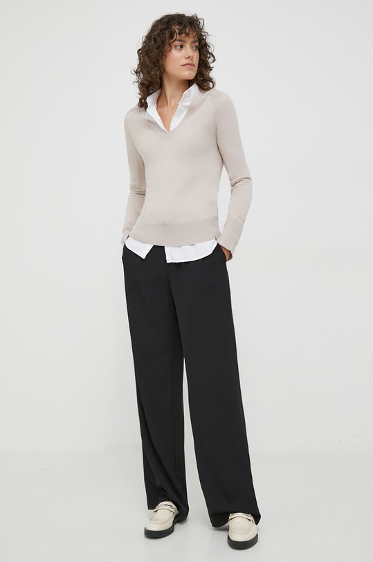 Vlněný svetr Calvin Klein K20K205988 béžová AW23