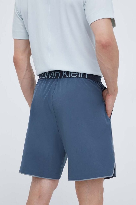 Дрехи Къс панталон за трениране Calvin Klein Performance 00GMF3S820 сив
