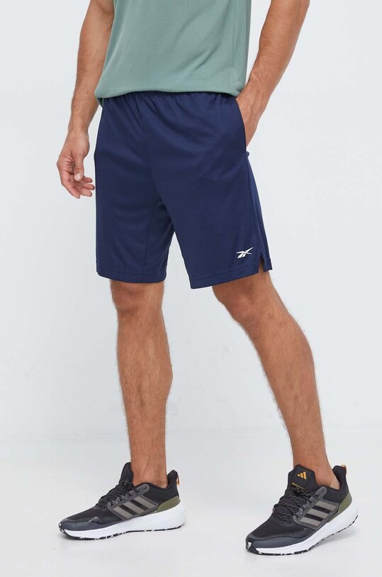 Reebok pantaloni scurți de antrenament Comm tricotaj bleumarin 100070671