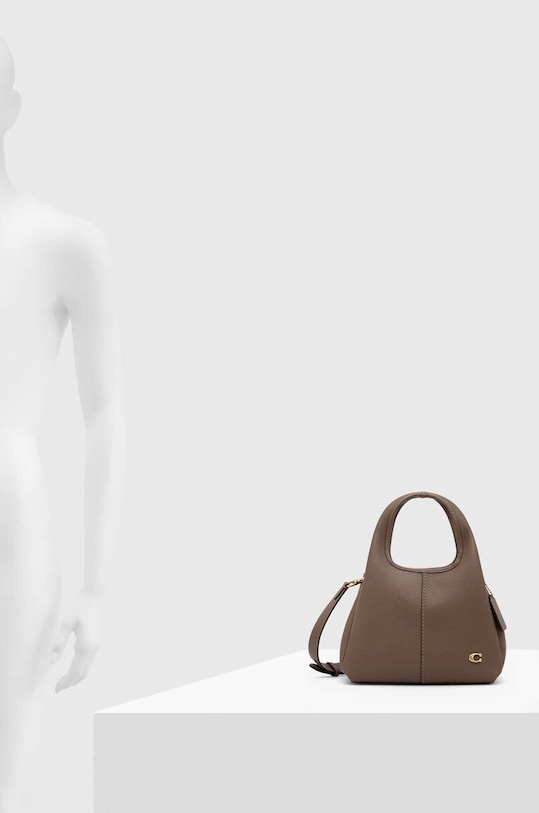 Kožená kabelka Coach CM545