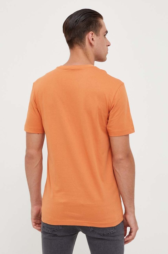 Ρούχα Βαμβακερό μπλουζάκι Calvin Klein Jeans J30J323483 πορτοκαλί
