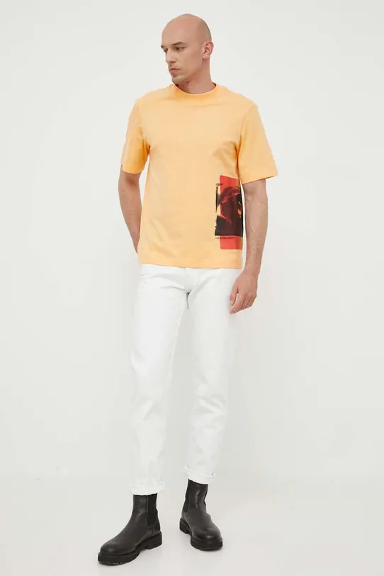 Хлопковая футболка Calvin Klein Jeans J30J323521 оранжевый AW23