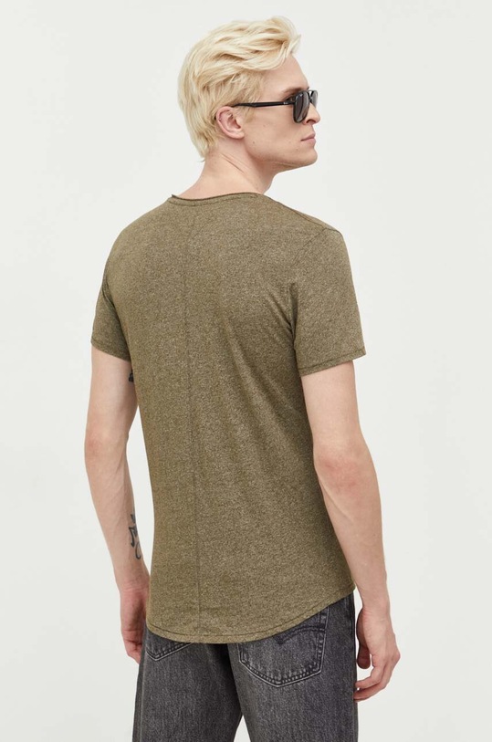 Ρούχα Μπλουζάκι Tommy Jeans DM0DM09586. πράσινο