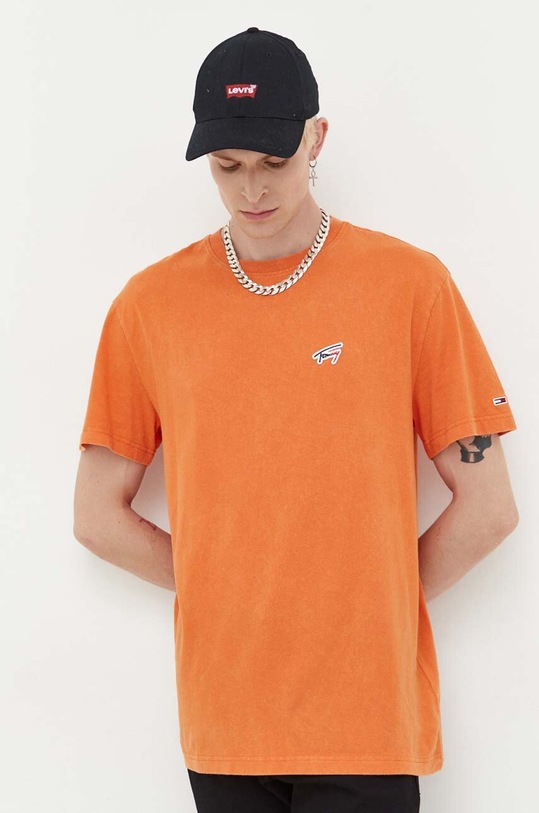 Βαμβακερό μπλουζάκι Tommy Jeans κανονικό πορτοκαλί DM0DM17910