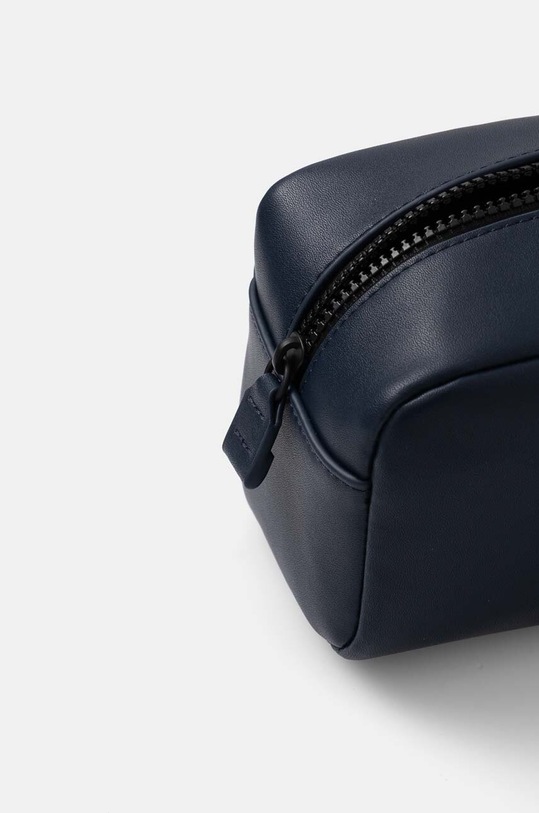 Δερμάτινη τσάντα καλλυντικών Tommy Jeans AM0AM12439 σκούρο μπλε