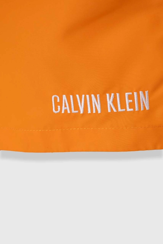 Băieți Calvin Klein Jeans pantaloni scurti de baie copii KV0KV000510JG.9BYH portocaliu