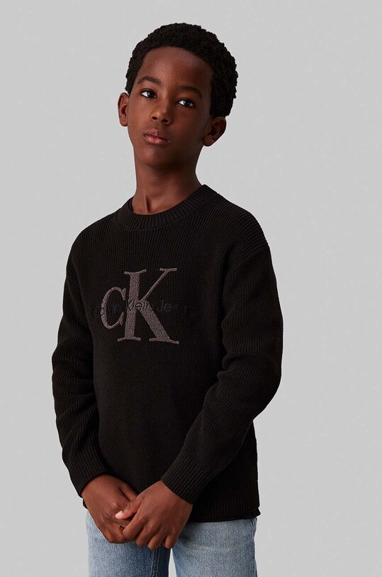 Calvin Klein Jeans sweter bawełniany dziecięcy aplikacja czarny IB0IB02219.104.116.9BYH