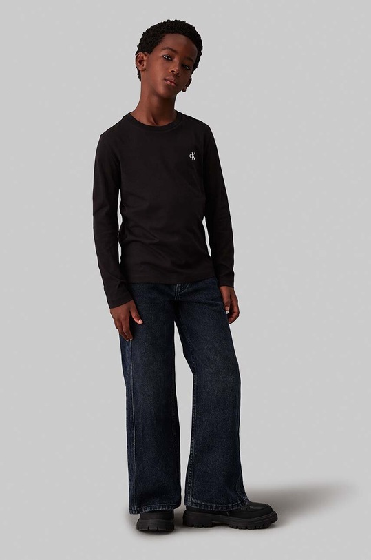 Дитячий бавовняний лонгслів Calvin Klein Jeans чорний IB0IB02255.128.176.9BYH