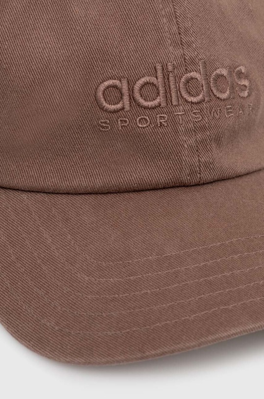 adidas czapka z daszkiem bawełniana SPW DAD CAP IX8015 brązowy SS25