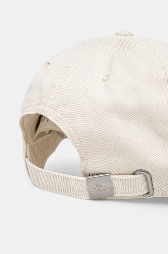 Doplňky Bavlněná baseballová čepice New Balance LAH43014LIN béžová
