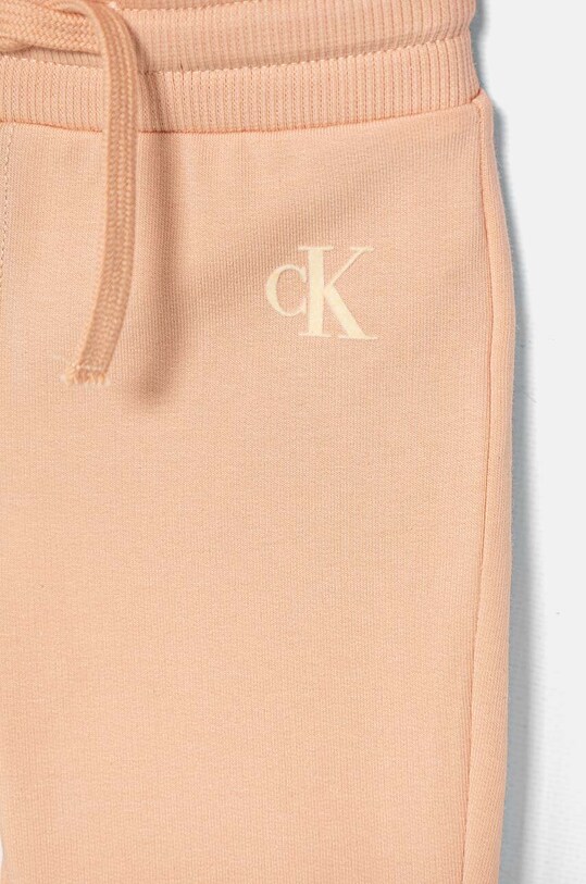 Tepláková súprava pre bábätká Calvin Klein Jeans oranžová IN0IN00213.G.9BYH