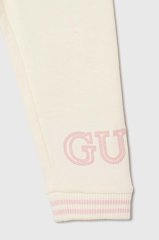 Дитячий бавовняний спортивний костюм Guess бежевий K4YG00.KA6R4.9BYH