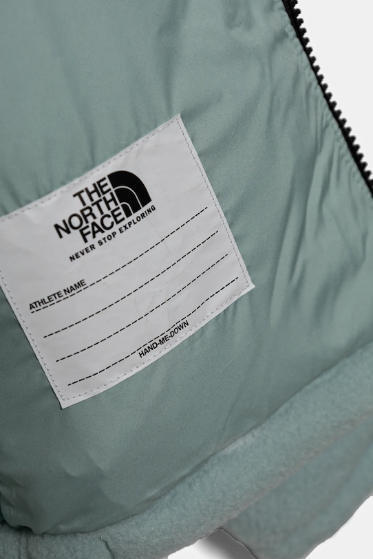 Chłopiec The North Face kurtka puchowa dziecięca KID 1996 RETRO NUPTSE JACKET NF0A82TS1OC1 turkusowy