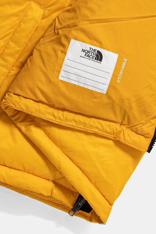 Chłopiec The North Face kurtka puchowa dziecięca TEEN 1996 RETRO NUPTSE JACKET NF0A8A4C56P1 żółty