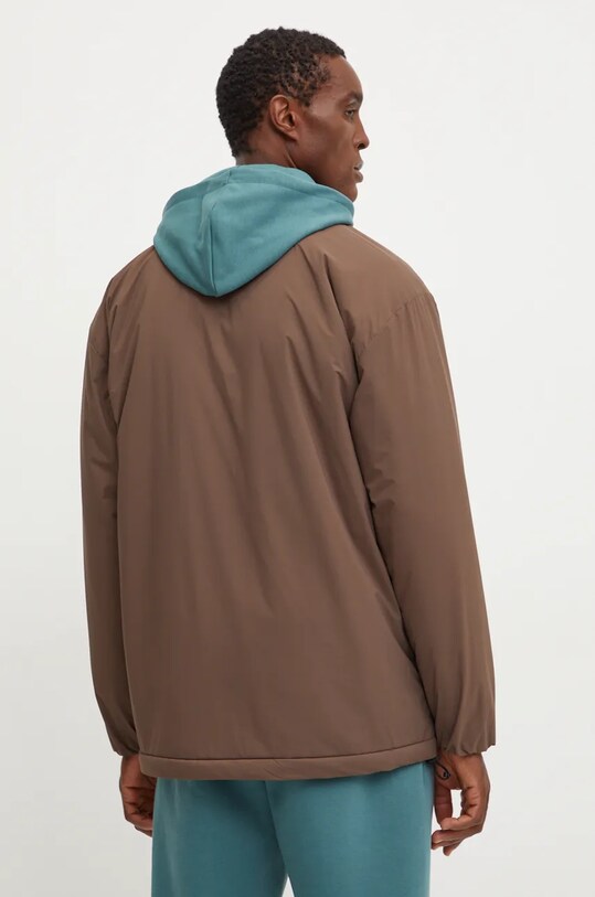 Abbigliamento New Balance giacca MJ43504DUO marrone