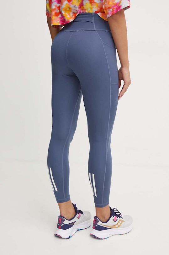 Odzież adidas Performance legginsy do biegania Own The Run IX2859 niebieski