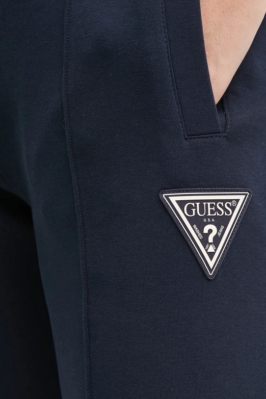 Tepláky Guess ANN námořnická modř V4BB19.KBCK2