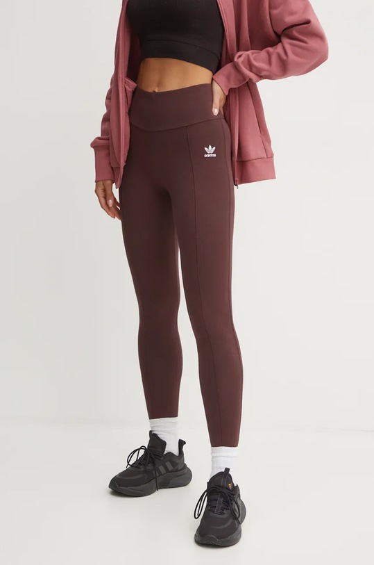 adidas Originals legginsy z elastanem brązowy IY9694