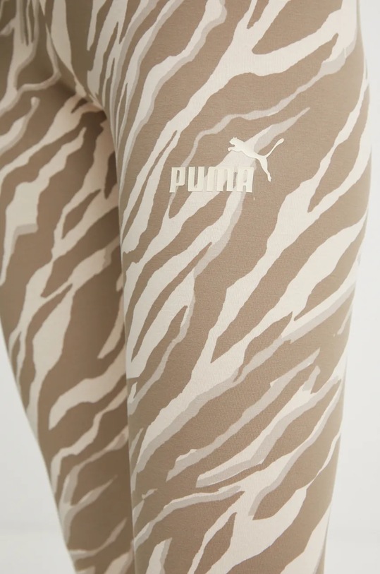 Puma legginsy beżowy 681494