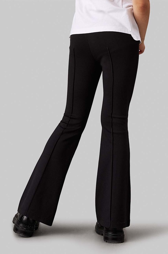 Calvin Klein Jeans legginsy dziecięce PUNTO TAPE FLARE IG0IG02518.9BYH.104.116 czarny