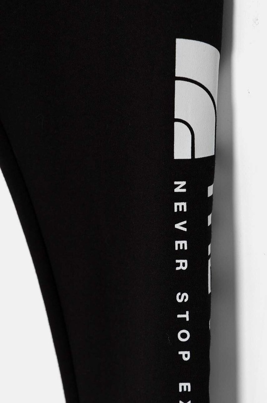 Chłopiec The North Face legginsy dziecięce VERTICAL GRAPHIC LEGGINGS NF0A89HVJK31 czarny
