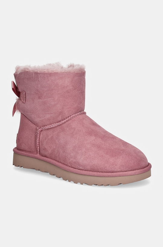 Snežke iz semiša UGG Mini Bailey Bow II Prijazno od planeta roza 1016501.DYR