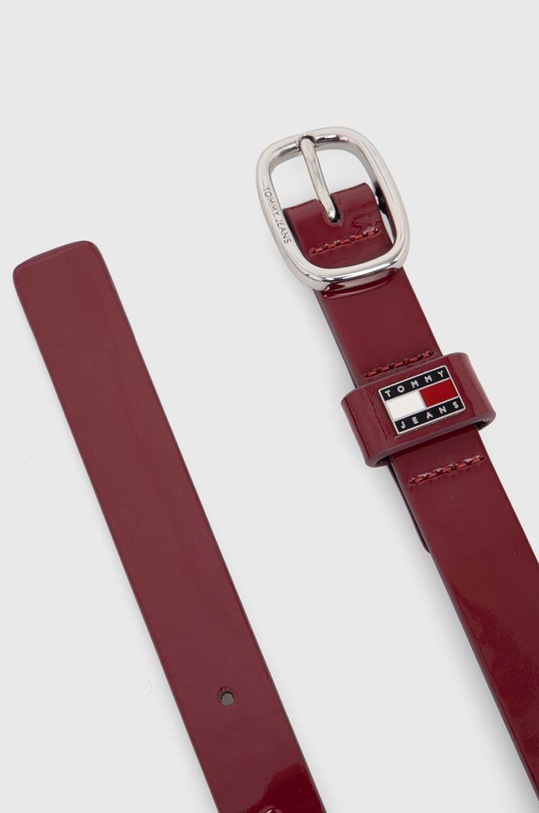 Kožený pásek Tommy Jeans AW0AW16257 burgundské AW24