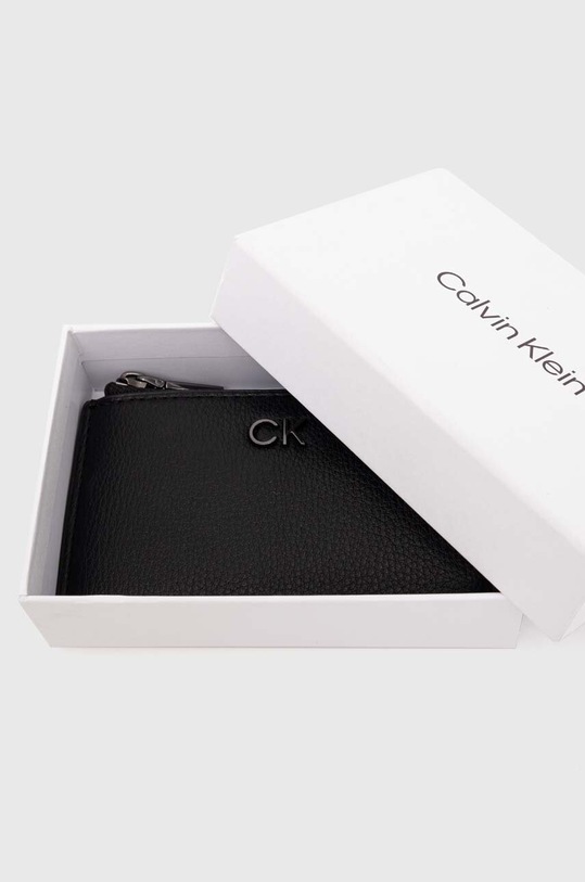 Akcesoria Calvin Klein etui na karty K60K612281 czarny
