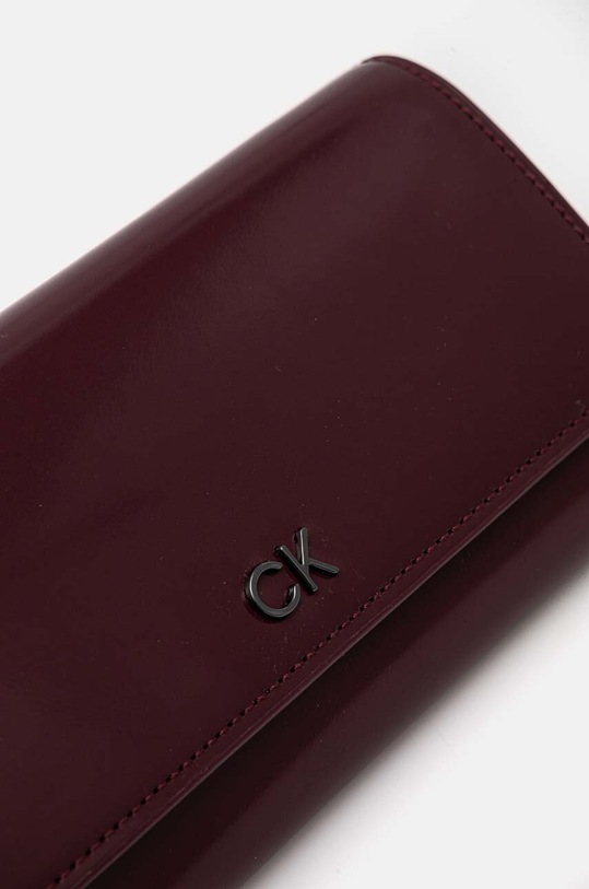 Calvin Klein portfel fioletowy K60K612423