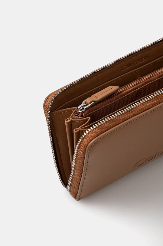 Аксесуари Гаманець Calvin Klein K60K612439 коричневий