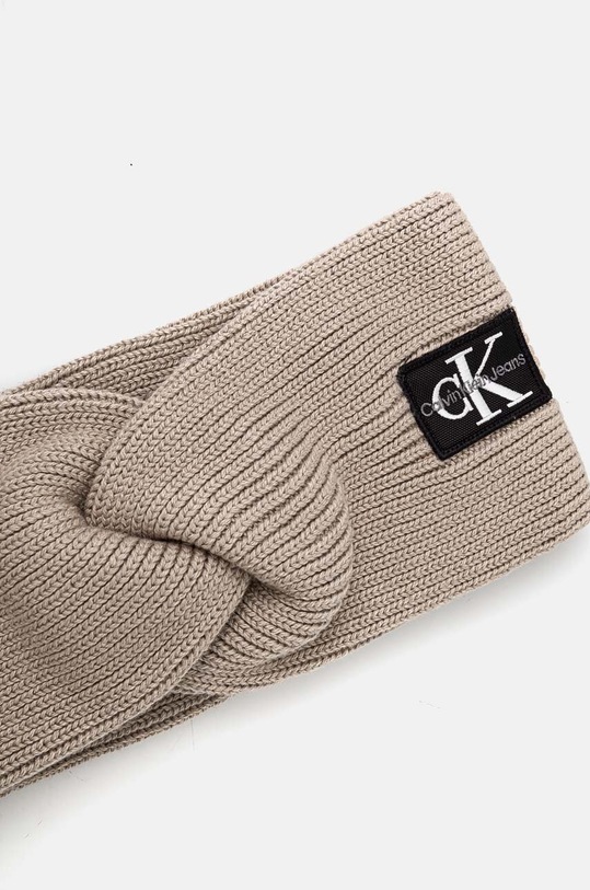 Čelenka Calvin Klein Jeans K60K612660 béžová AW24