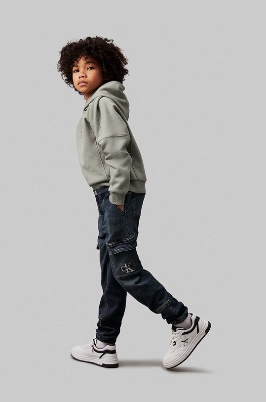 Detské rifle Calvin Klein Jeans DENIM JOGGER tmavomodrá IB0IB02116.9BYH