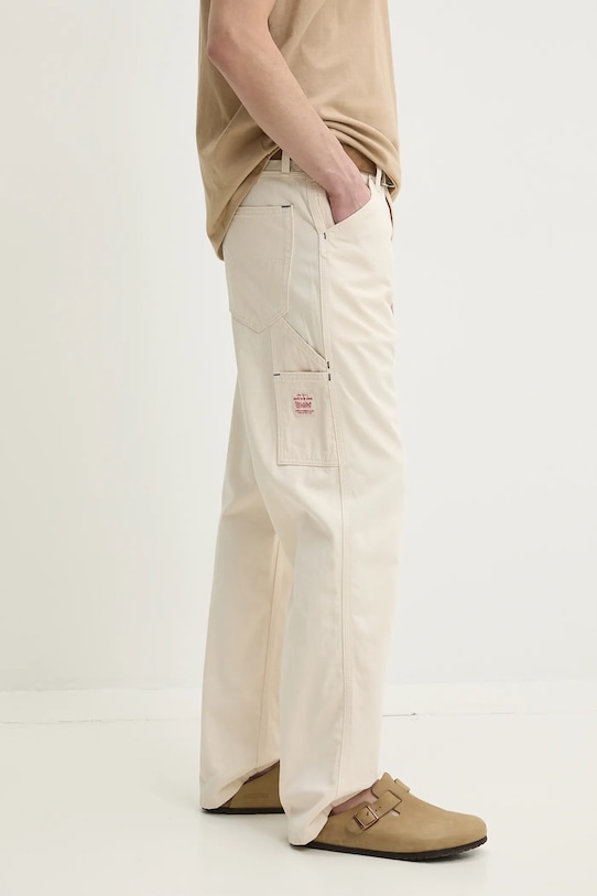 Bavlněné kalhoty Levi's béžová 55849