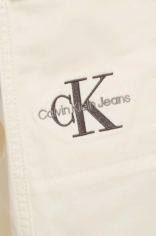 Хлопчик Дитячі спортивні штани Calvin Klein Jeans WOVEN CARGO IB0IB02270.9BYH бежевий