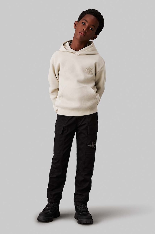 Детски спортен панталон Calvin Klein Jeans WOVEN CARGO еластичен черен IB0IB02270.9BYH