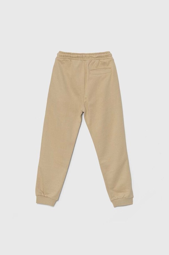 Дитячі спортивні штани Calvin Klein Jeans TERRY JOGGER IB0IB02119.9BYH бежевий AW24