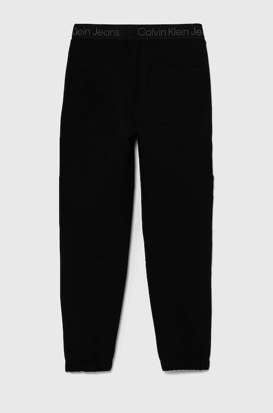 Chłopiec Calvin Klein Jeans spodnie dresowe dziecięce TERRY CARGO IB0IB02121.9BYH czarny