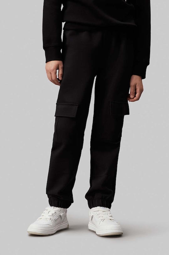 Calvin Klein Jeans spodnie dresowe dziecięce TERRY CARGO IB0IB02121.9BYH