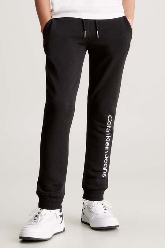 Calvin Klein Jeans spodnie dresowe bawełniane dziecięce REGULAR JOGGER nadruk czarny IU0IU00604.9BYH