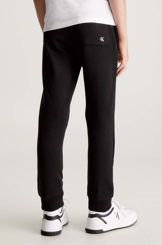 Calvin Klein Jeans spodnie dresowe bawełniane dziecięce REGULAR JOGGER IU0IU00604.9BYH czarny