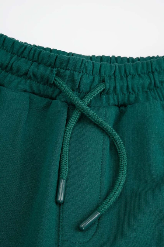 Coccodrillo spodnie dresowe bawełniane dziecięce zielony ZC4120103ABJ