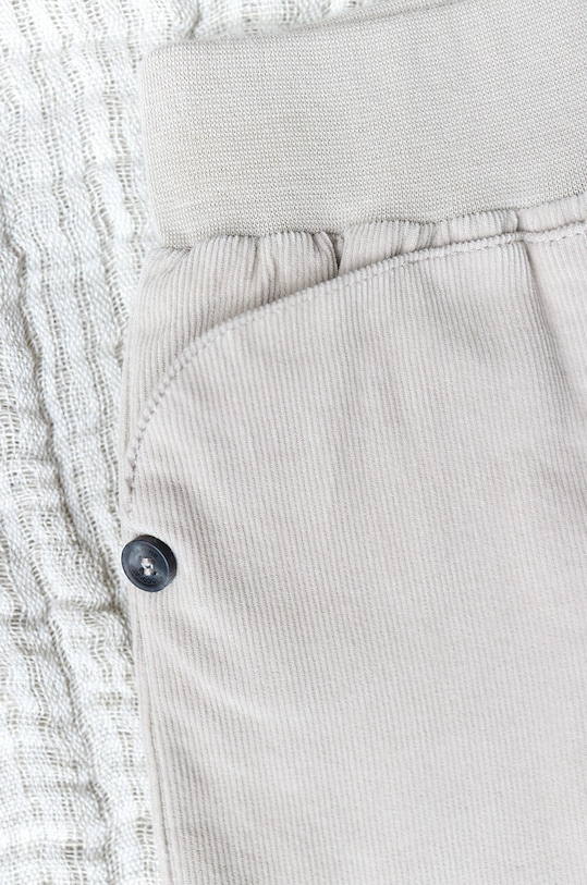 Дитячі бавовняні штани Tartine et Chocolat TZ22060.60.74 бежевий