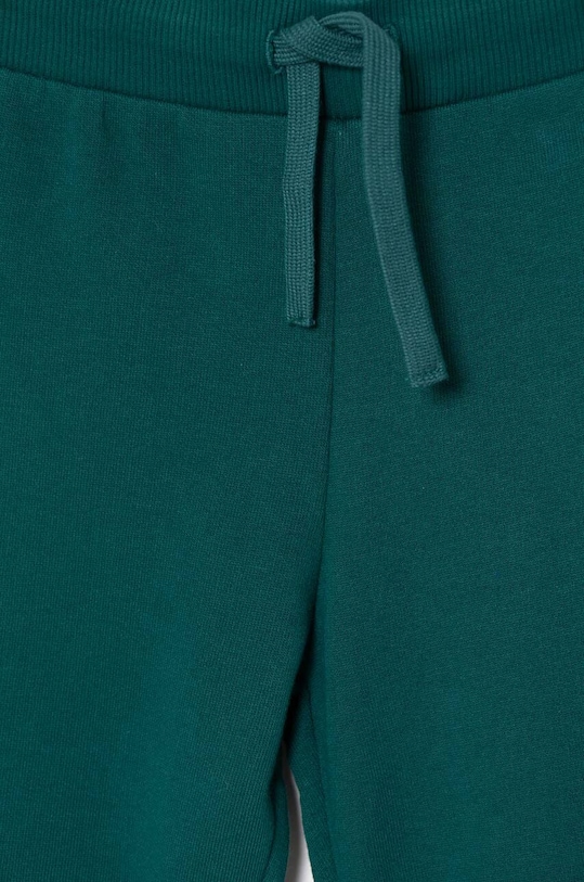 CHLAPEC Dětské bavlněné tepláky United Colors of Benetton 3J68CF01P.B.G.Seasonal zelená