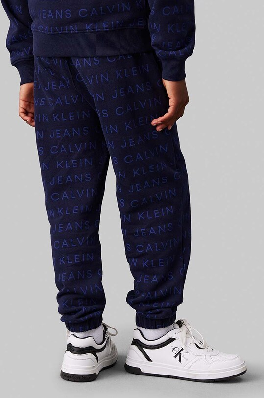 Детские хлопковые штаны Calvin Klein Jeans AOP JOGGER IB0IB02323.128.176.9BYH