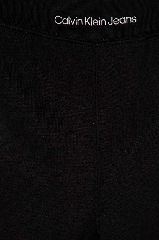 Chłopiec Calvin Klein Jeans spodnie dresowe dziecięce WAISTBAND EMB IB0IB02327.9BYH czarny