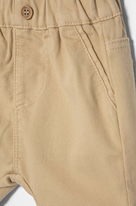 Chłopiec United Colors of Benetton spodnie niemowlęce 4AU0AF018.W.Seasonal beżowy