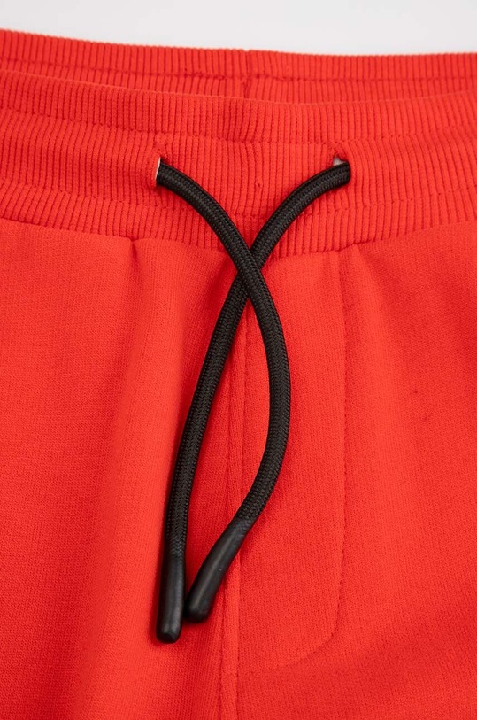 Chłopiec Coccodrillo spodnie dresowe bawełniane dziecięce ZC4120105VBA czerwony